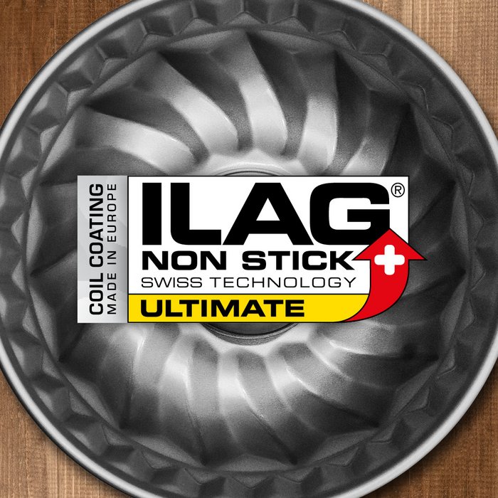 Silver coated inside of a ring cake pan - ILAG logo with yellow shaded Ultimate lettering in the center and on the left hand side an extra labeling "Coil Coating-Made in Europe"