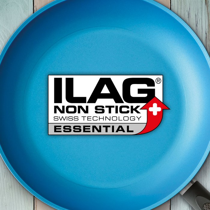 Light blue coated inside of a frying pan - ILAG logo with grey shaded Essential lettering in the center