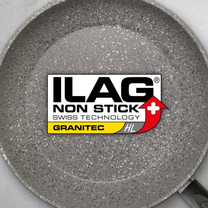 Coated inside of a frying pan with grey base and black and white marble effect - ILAG logo with yellow shaded Granitec HL lettering in the center